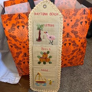 Kitsch Daytona Beach wall hanging. Embroidered mail holder
